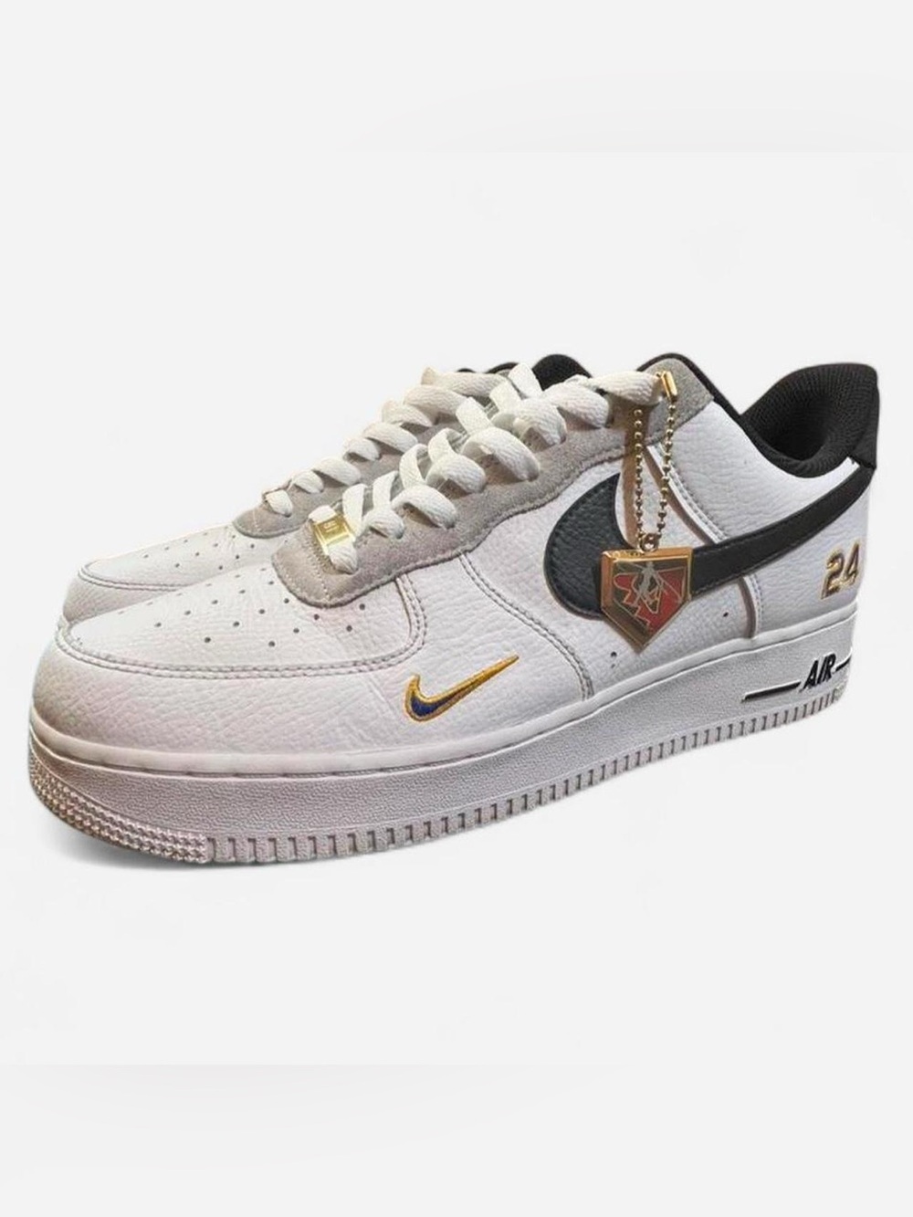 Nike White and Black Leather Sneakers with Gold Accents